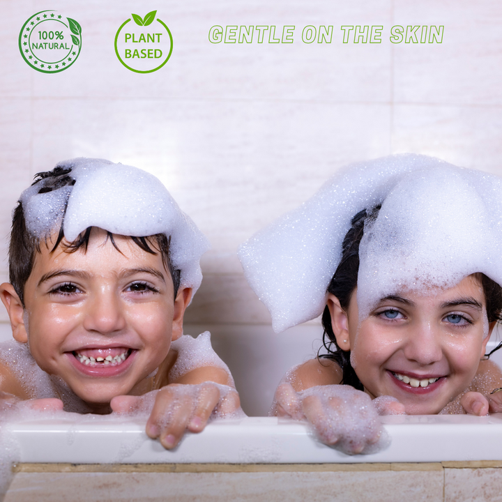 Two kids in bathtub with bubbles